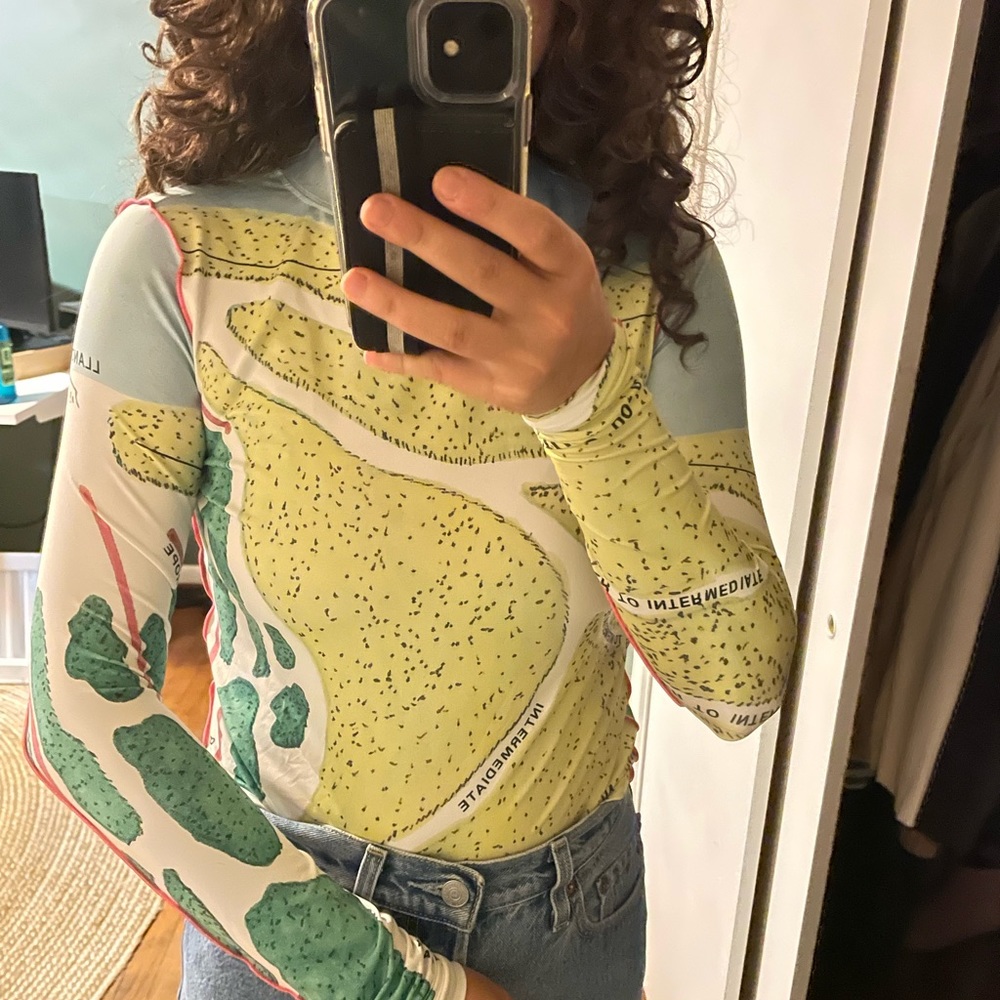 Geographical pattern long sleeve mock neck top